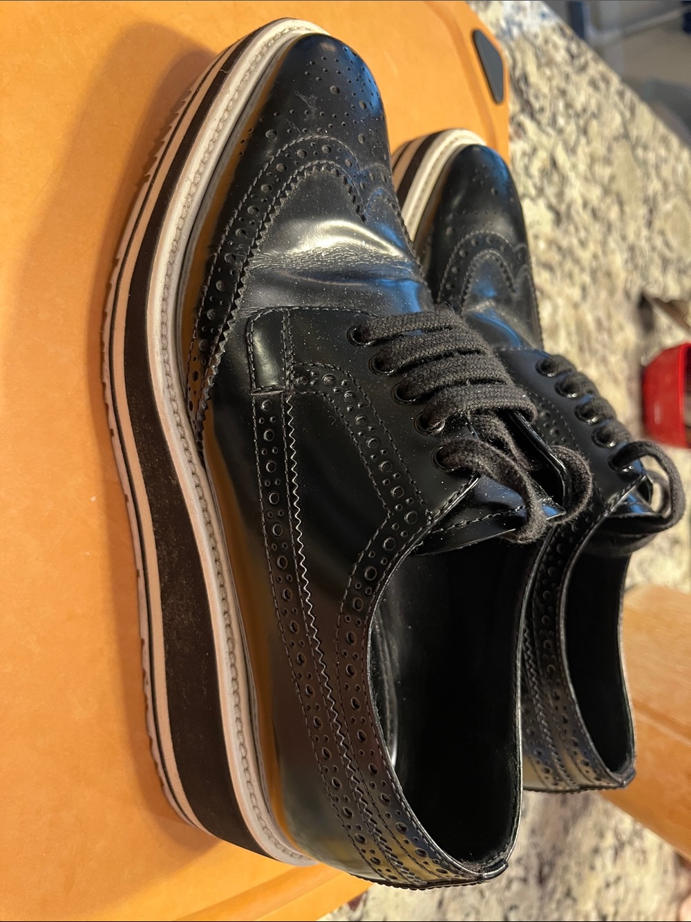 Prada Black Leather Wingtip Brogues with Contrasting Layered Sole